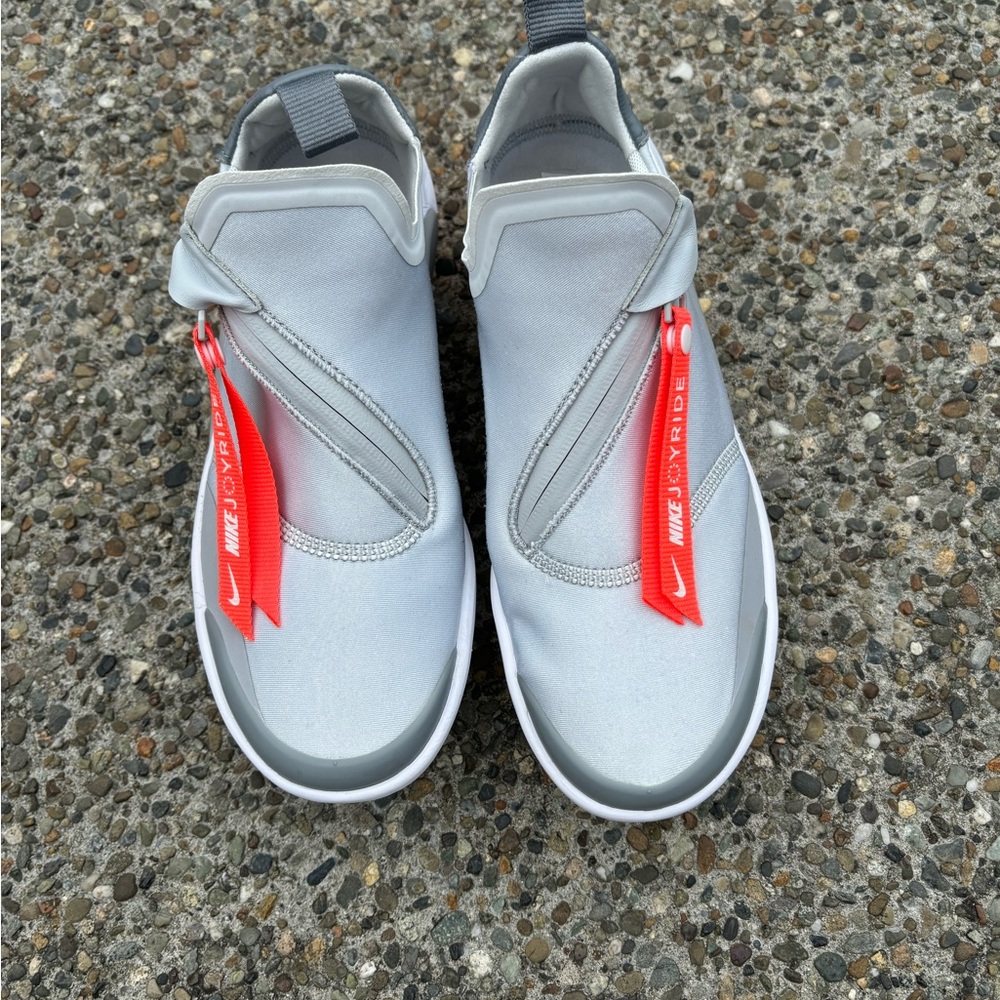 Nike Gray and Orange Joyride size 7.